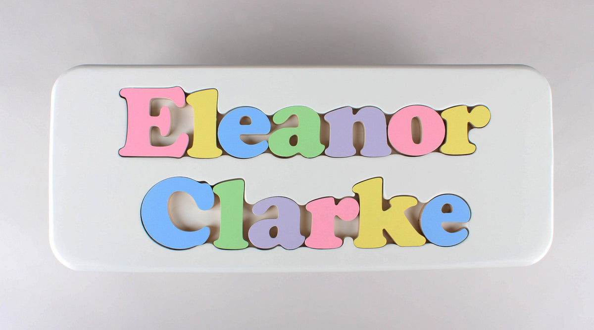 white puzzle step stool with name